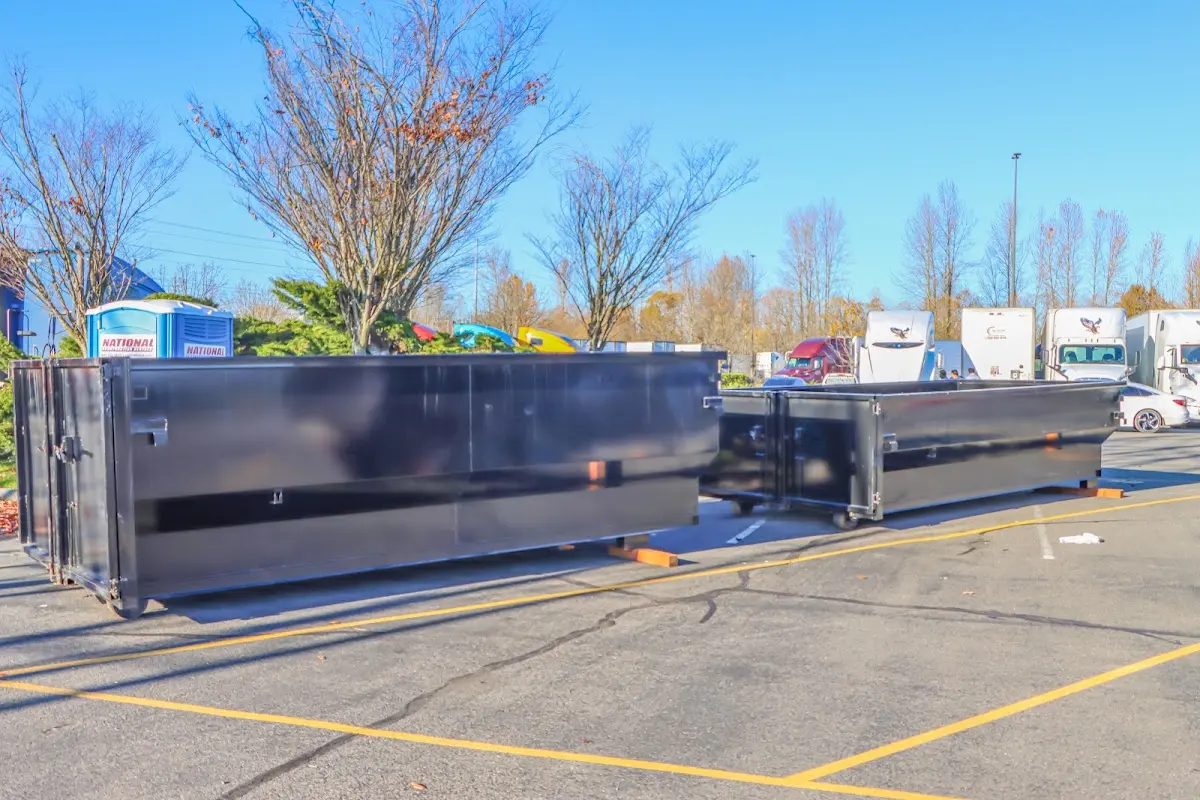 Professional dumpster rental service with roll-off container on residential driveway in El Paso de Robles (Paso Robles)